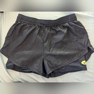Nike Black Women's Athletic Shorts with Yellow Logo